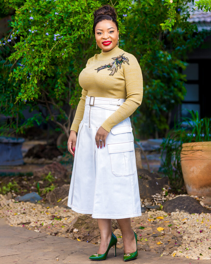 The Embellished Mock Neck Top & Belted Skirt Set