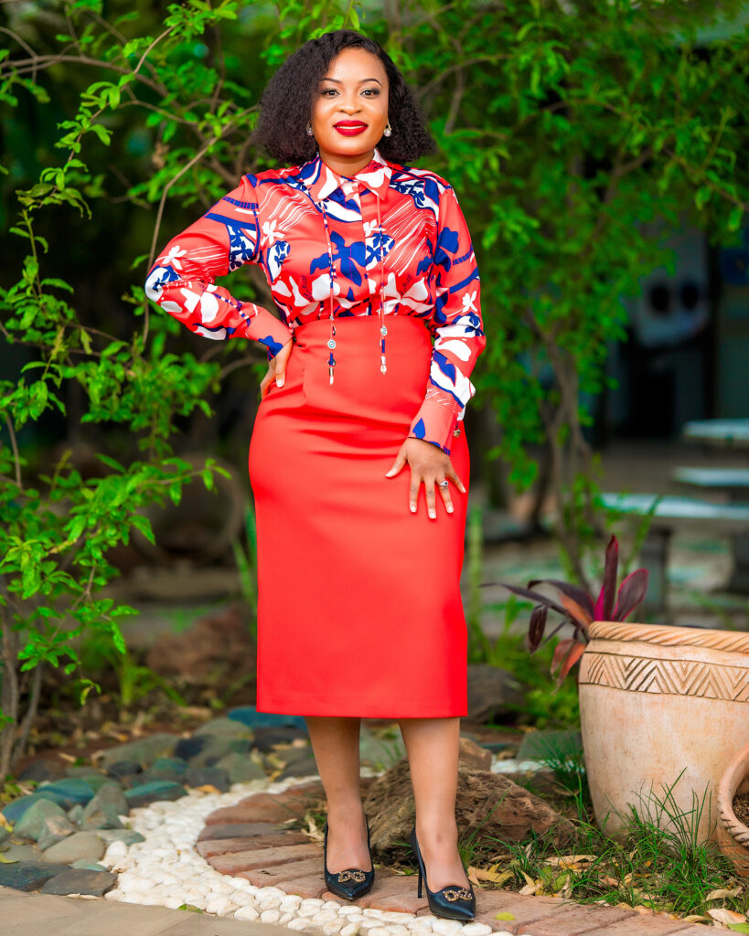 The Scarlet Bloom Abstract Print Blouse And Red Skirt